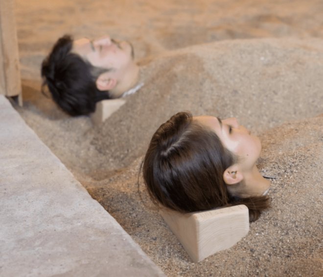 External research of a relaxing hot sand bath experience.